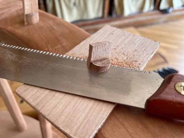 Sawing tenon flush to a 5mm scrap placed over the tenon