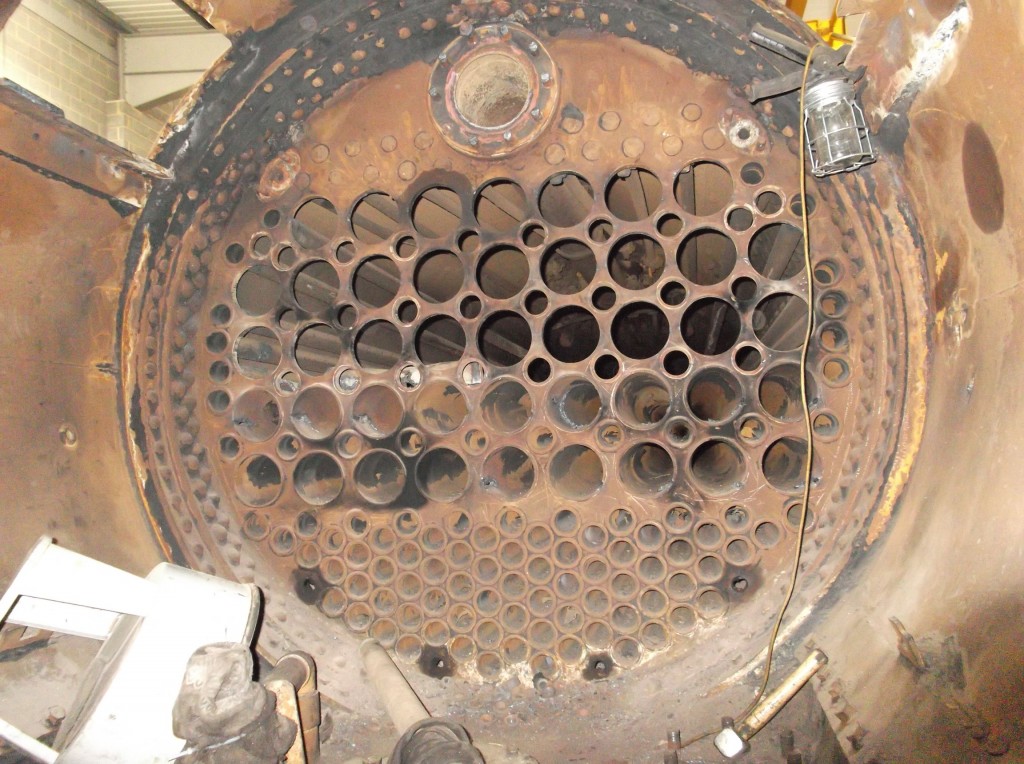 The front tubeplate - top 3 rows of flue tubes with surrounding small smoke tubes removed