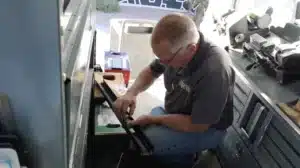 locksmith working on panic bar